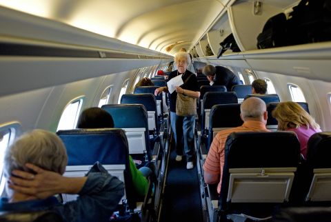 When a man on a United Airlines flight refused to remove his Knee Defender, which blocks seats from reclining, the woman in front of him threw water in his face. The plane was diverted to Chicago, where both passengers were removed. (File photo)