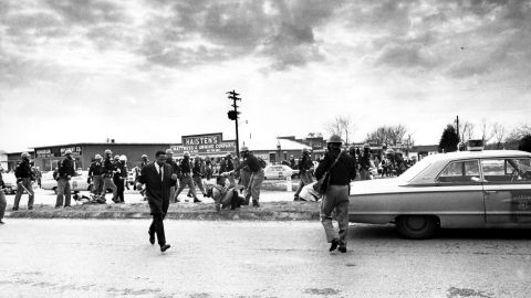 Civil rights leaders Hosea Williams (wearing a suit) and John Lewis (on the ground) led the march on that Sunday afternoon. Lewis, who has been a congressman from Georgia since being elected in 1986, was badly injured in Selma, suffering a fractured skull after being beaten by troopers.