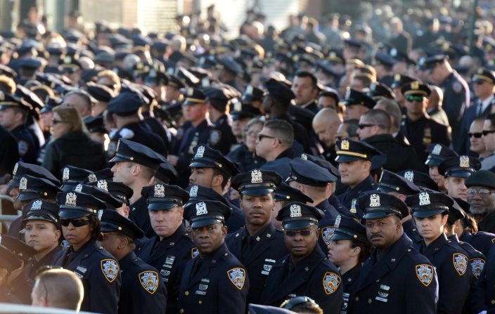 Thousands of police officers gathered to pay their respects outside the church.
