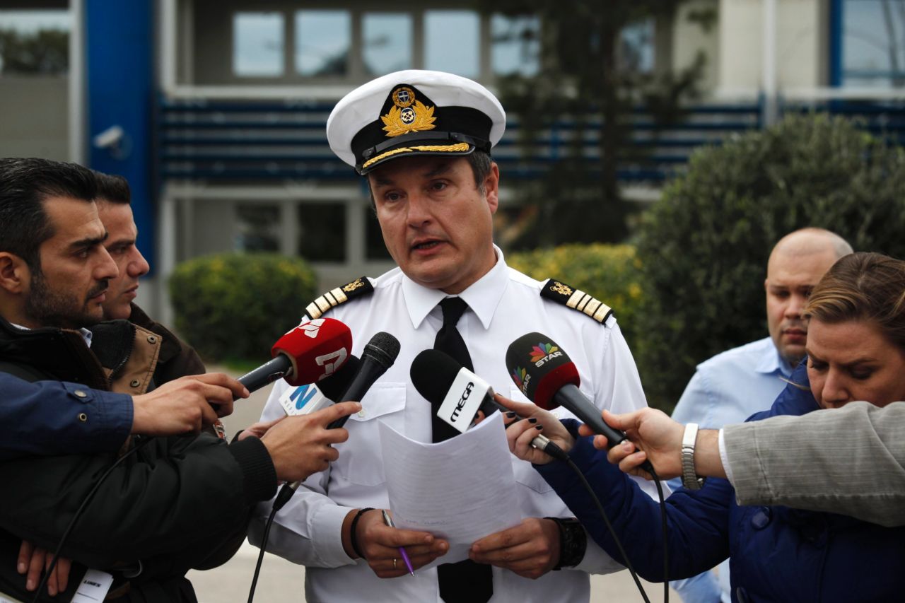 Greece's Coast Guard spokesman Nikolaos Lagadianos delivers a statement  concerning the fire to the media in Piraeus port. 