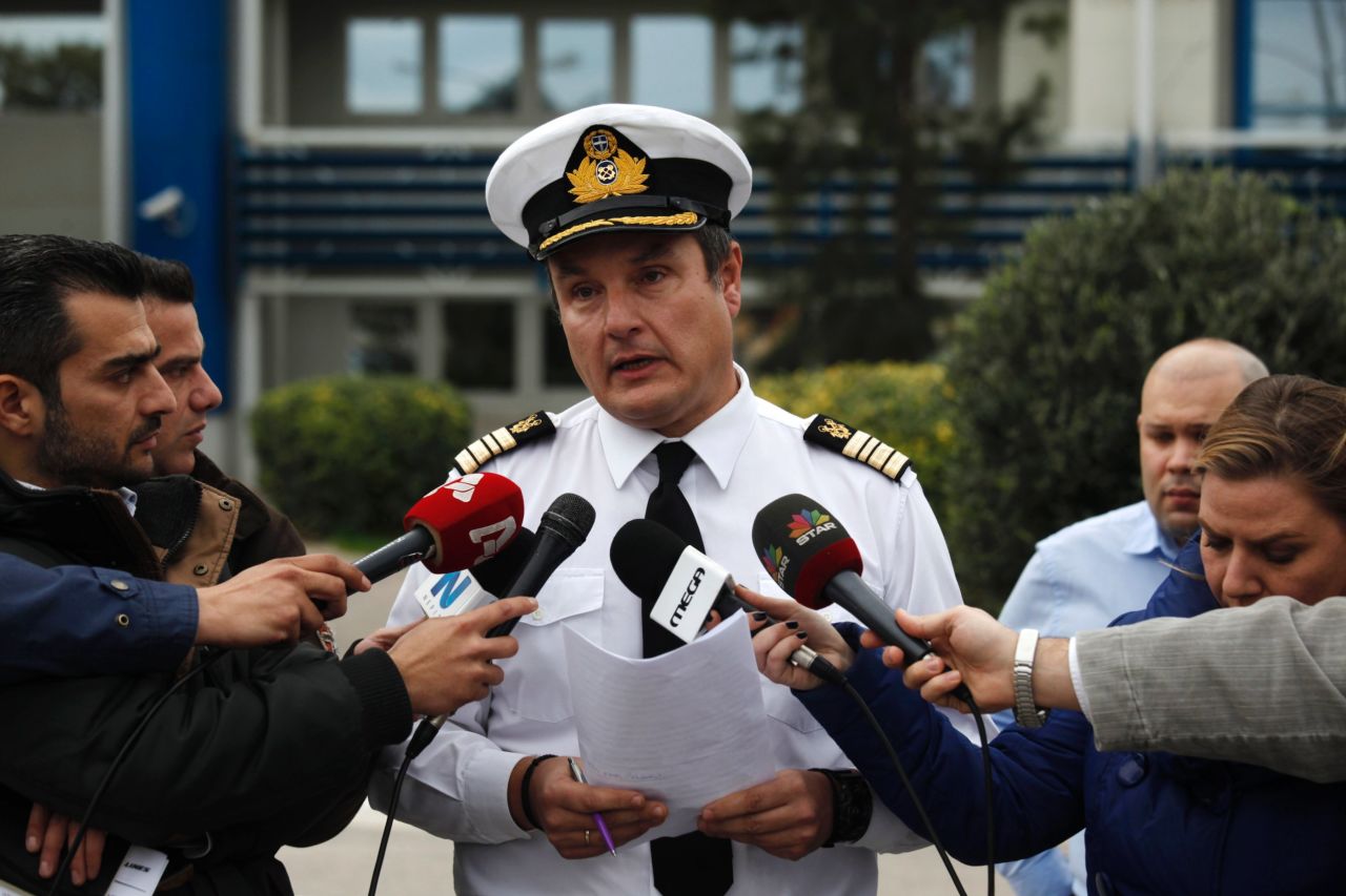 Greece's Coast Guard spokesman Nikolaos Lagadianos delivers a statement concerning the fire to the media in Piraeus port.