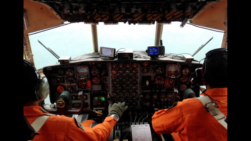 Image #: 33967831    JAKARTA, INDONESIA - DECEMBER 28: Military personnels seen aboard Hercules military aircraft, during a search operation from Halim Perdana Kusuma Airport, to the point where AirAsia flight lost its contact with Air Asia Surabaya-Singapore route on December 28, 2014 in Jakarta, Indonesia.  AirAsia flight QZ8501, flying from Indonesia to Singapore with 162 people on board is missing on December 28.        Agoes Rudianto/Barcroft Media /Landov