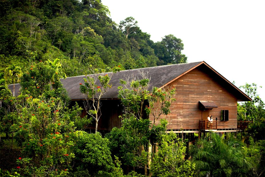 The Hilton longhouse hotel is modeled on traditional communal living spaces used by Iban tribes.