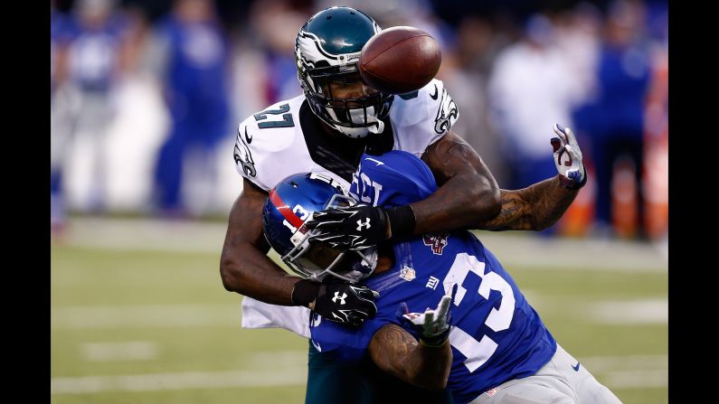 Malcolm Jenkins of the Philadelphia Eagles, top, defends Odell Beckham Jr. of the New York Giants during an NFL game Sunday, December 28, in East Rutherford, New Jersey.