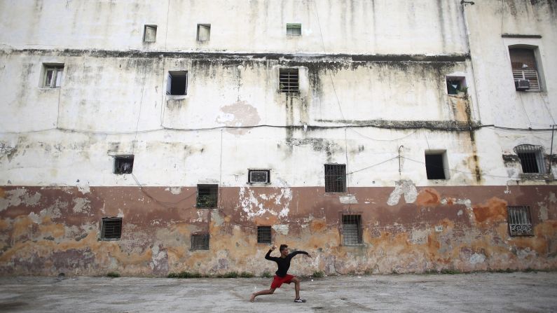 Ivan Ramos, 15, plays baseball in Havana, Cuba, on Thursday, December 25.