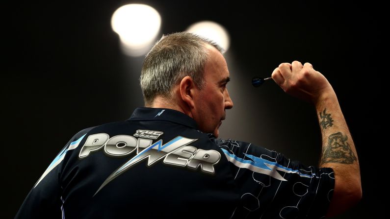 Phil Taylor competes in the World Darts Championships on Sunday, December 28. Taylor, an Englishman who has won 16 world titles in his illustrious career, defeated Mark Webster to advance to the third round of the tournament, which is taking place in London. 