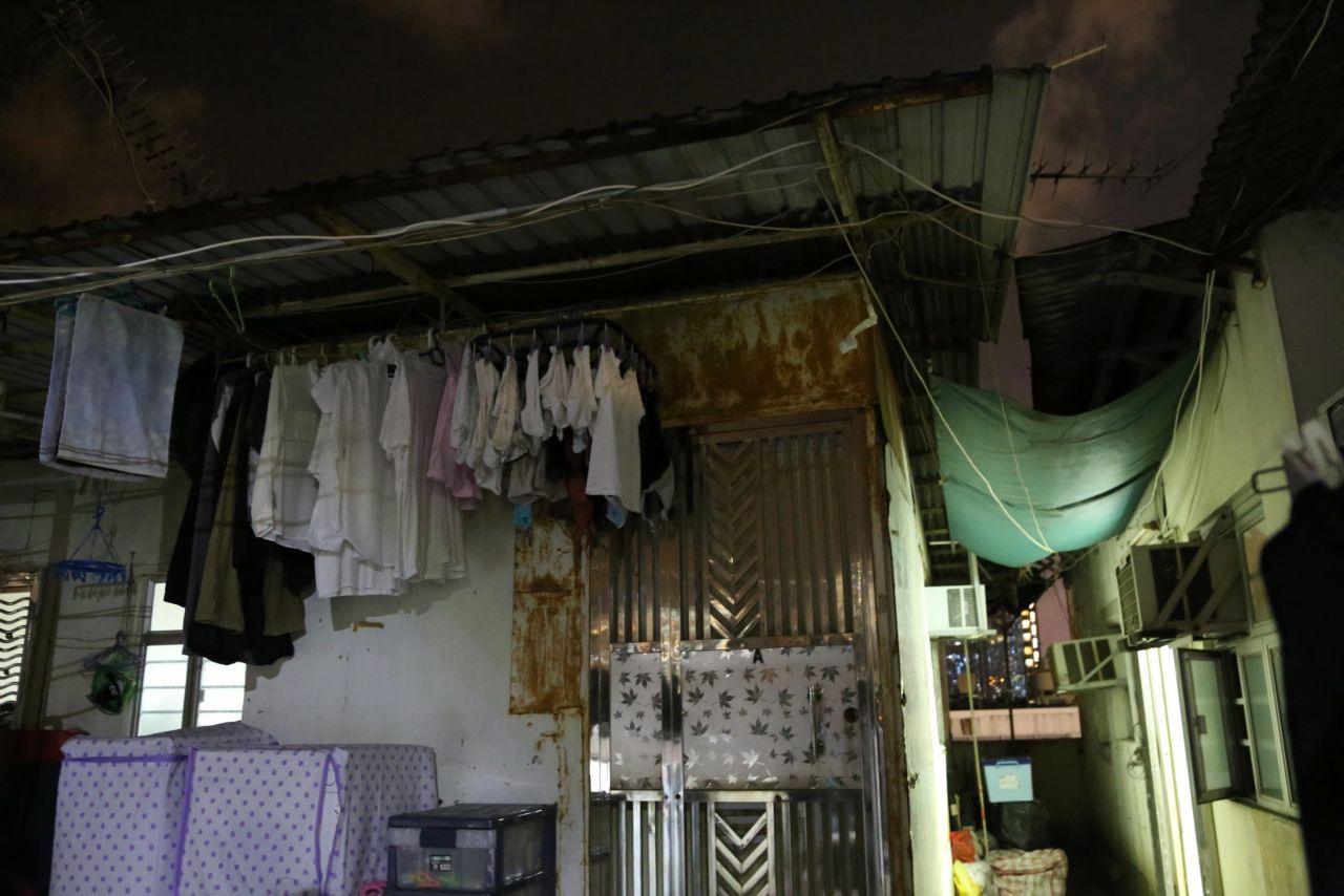 Built on top of an industrial building in Kwun Tong, these rooftop slums are usually built from wood, rusty metal sheets or other flimsy materials.