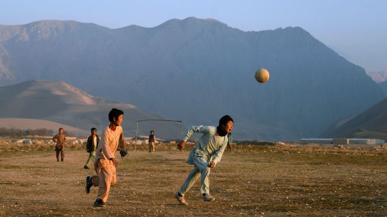 Children play soccer in a village on the outskirts of Mazar-i-Sharif, Afghanistan, on Tuesday, December 23.