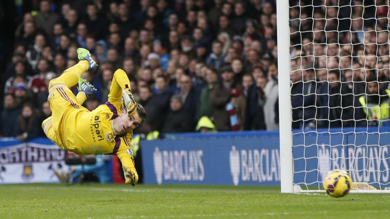 West Ham goalkeeper Adrian dives for a shot during a Premier League match against Chelsea on Friday, December 26. Chelsea won the home match 2-0 to stay in first place.