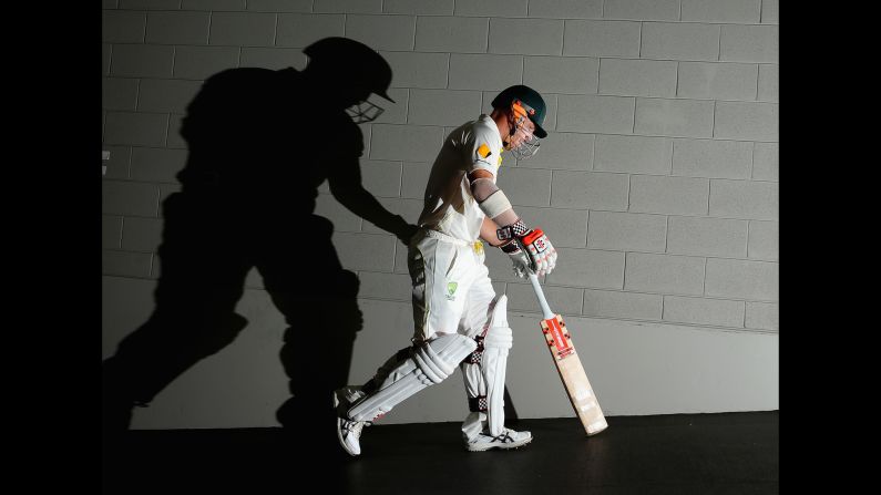 Australian cricket player David Warner walks out to bat against India on Monday, December 29. <a href="index.php?page=&url=http%3A%2F%2Fwww.cnn.com%2F2014%2F12%2F22%2Fworldsport%2Fgallery%2Fwhat-a-shot-1223%2Findex.html" target="_blank">See 29 amazing sports photos from last week</a>