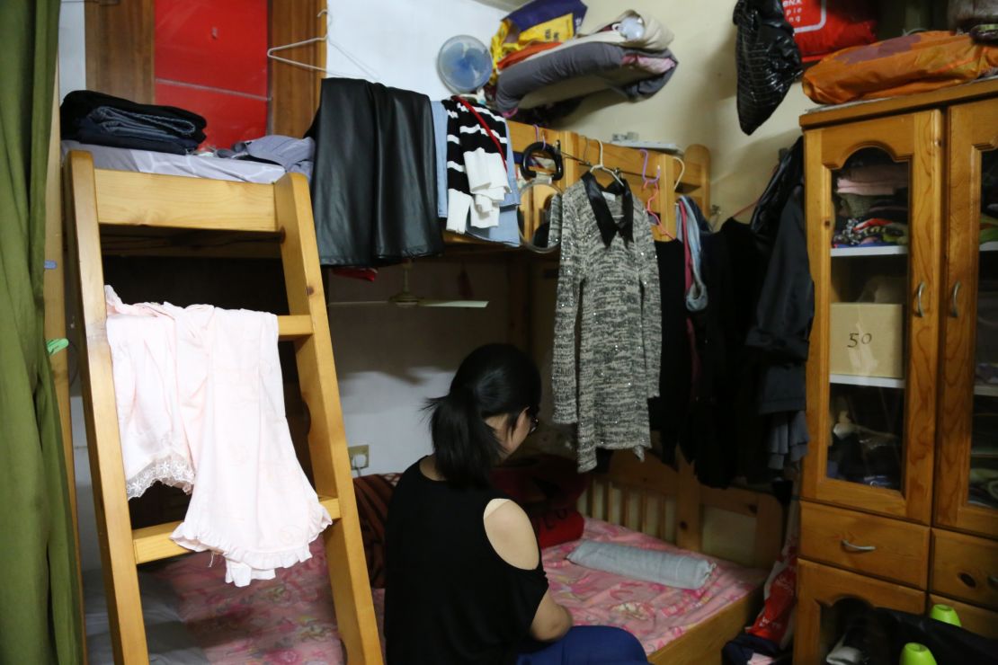 Joyce, Ngan Chau Yee shares a bunk bed with her mother and younger brother.