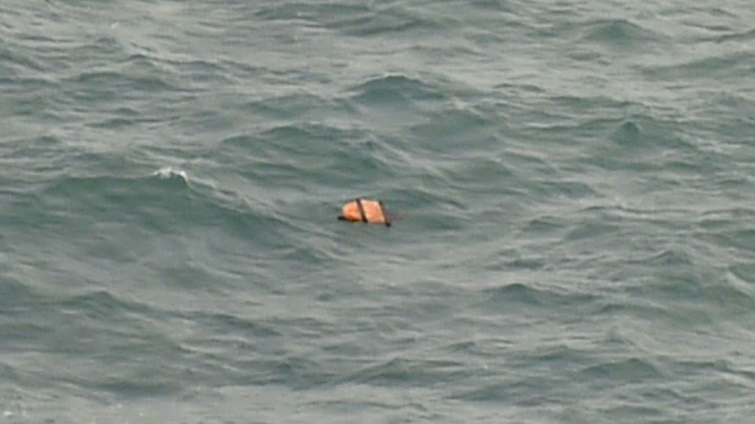 Debris floats in the Java Sea on December 30.