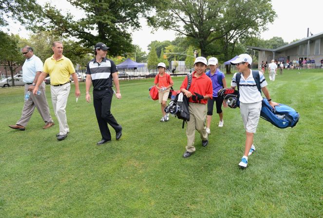 Rory McIlroy (left) hosts a junior golf clinic in New York in 2012. The world No. 1 is an ambassador for junior golf  -- a role that could be vital in keeping the younger generation interested in the sport.  