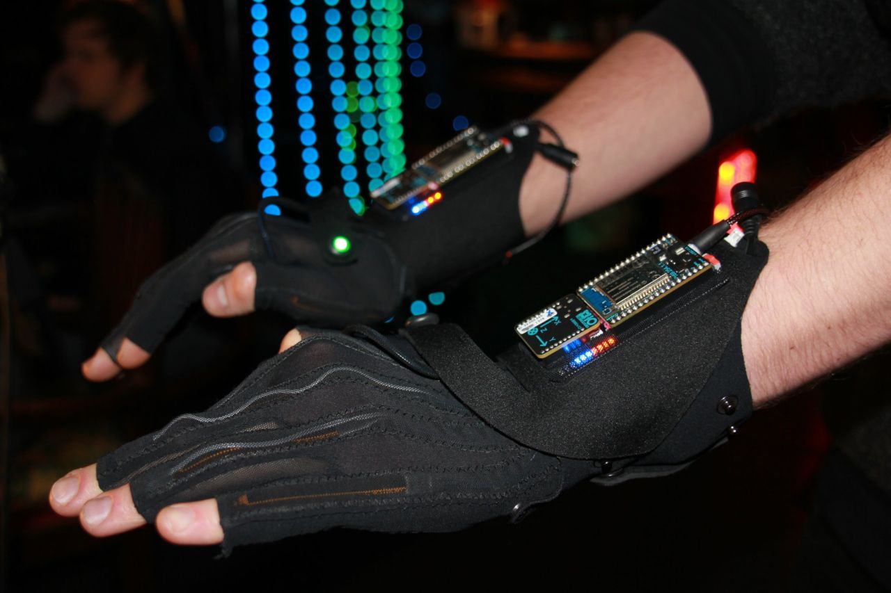 The music-manipulating gloves, as demonstrated by a Mi.Mu team member, are the latest attempt by Grammy Award-winning musician Imogen Heap to bring technology and music together in visually stimulating harmony.