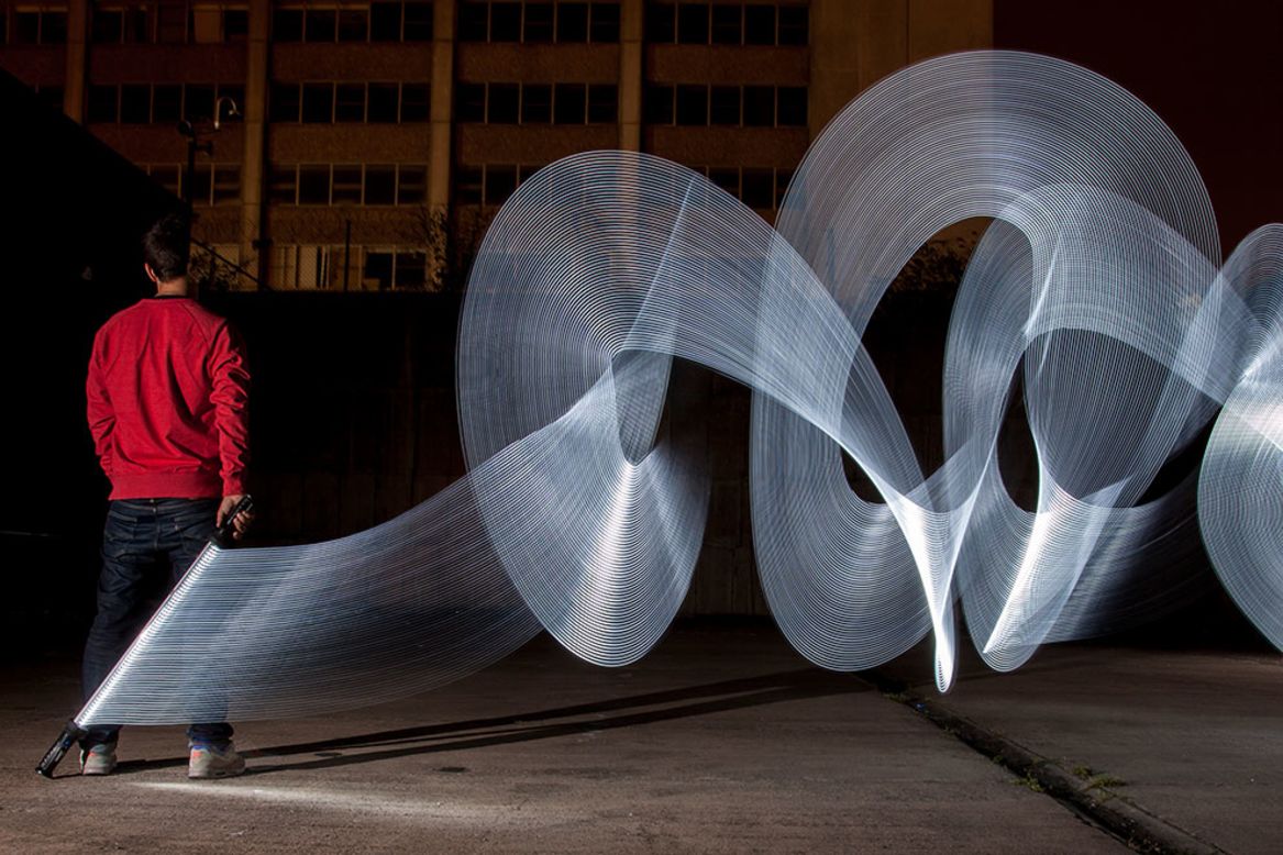 Birmingham-based photographer Pete Medlicott is more commonly known on the streets by his artistic alter ego, "Sola." Under his artistic pseudonym, he has been creating intense light sculptures. But in the blink of an eye, they are gone. 