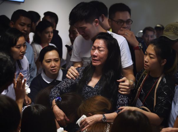 Relatives gather at Juanda International Airport as they wait for news on December 30.