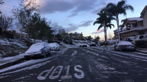 Snow joined palm trees in Orange County.