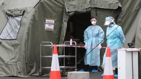 Medical staff members work at a Covid-19 testing center in Newbridge, Ireland, on Monday.
