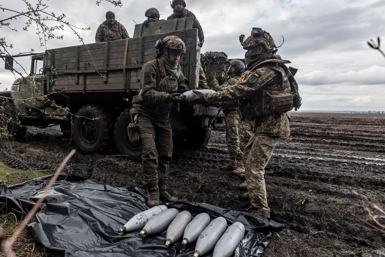 Ukrainian soldiers of the 24th Separate Assault Battalion unload ammunition from a military truck near the frontline in Bakhmut, Ukraine, on April 22.