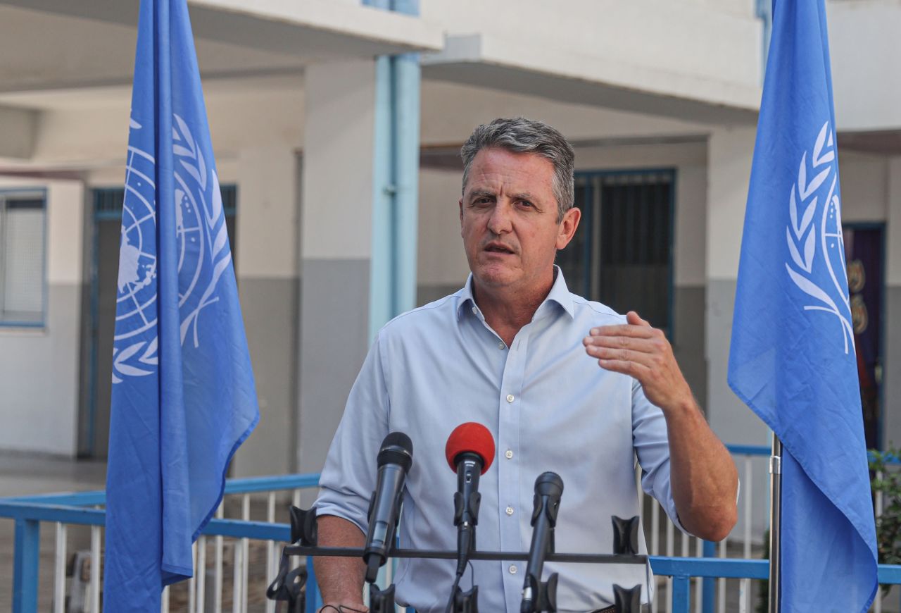 Thomas White speaks to press as he visits a UNRWA school in Gaza City, on August 27.