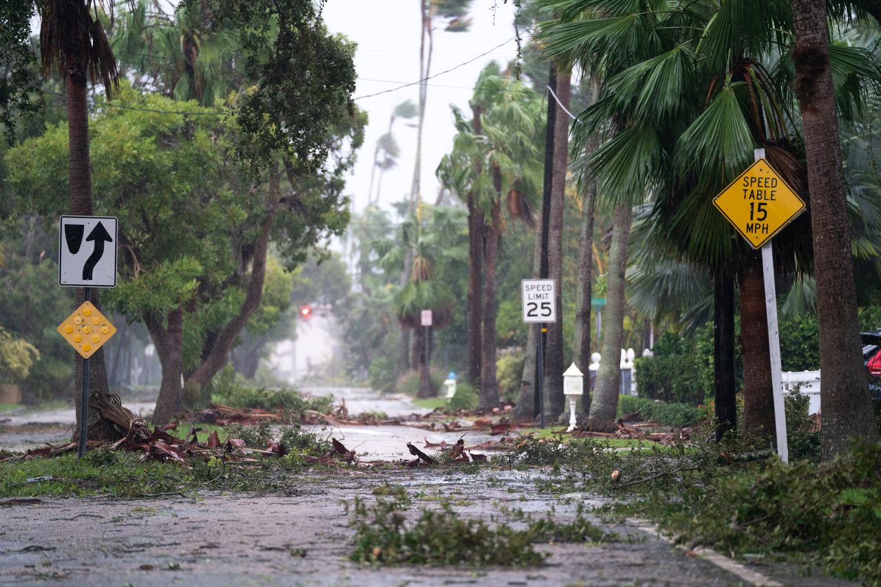Storm debris litters a street in the wake of Hurricane Ian September 28, in Sarasota.