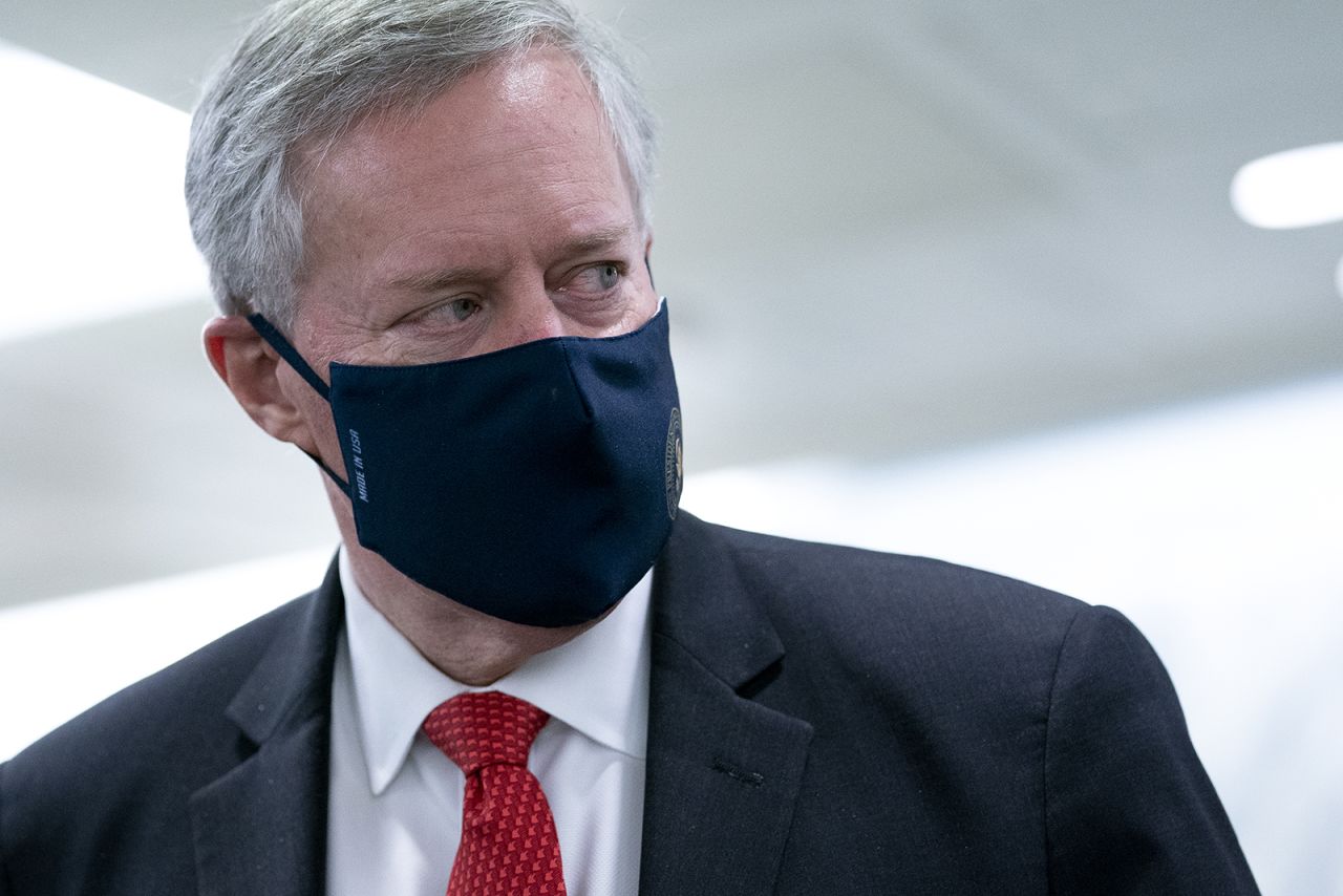 White House Chief of Staff Mark Meadows wears a protective mask as he departs the Senate Republican policy luncheon in the Hart Senate Office Building on Capitol Hill on October 21 in Washington.