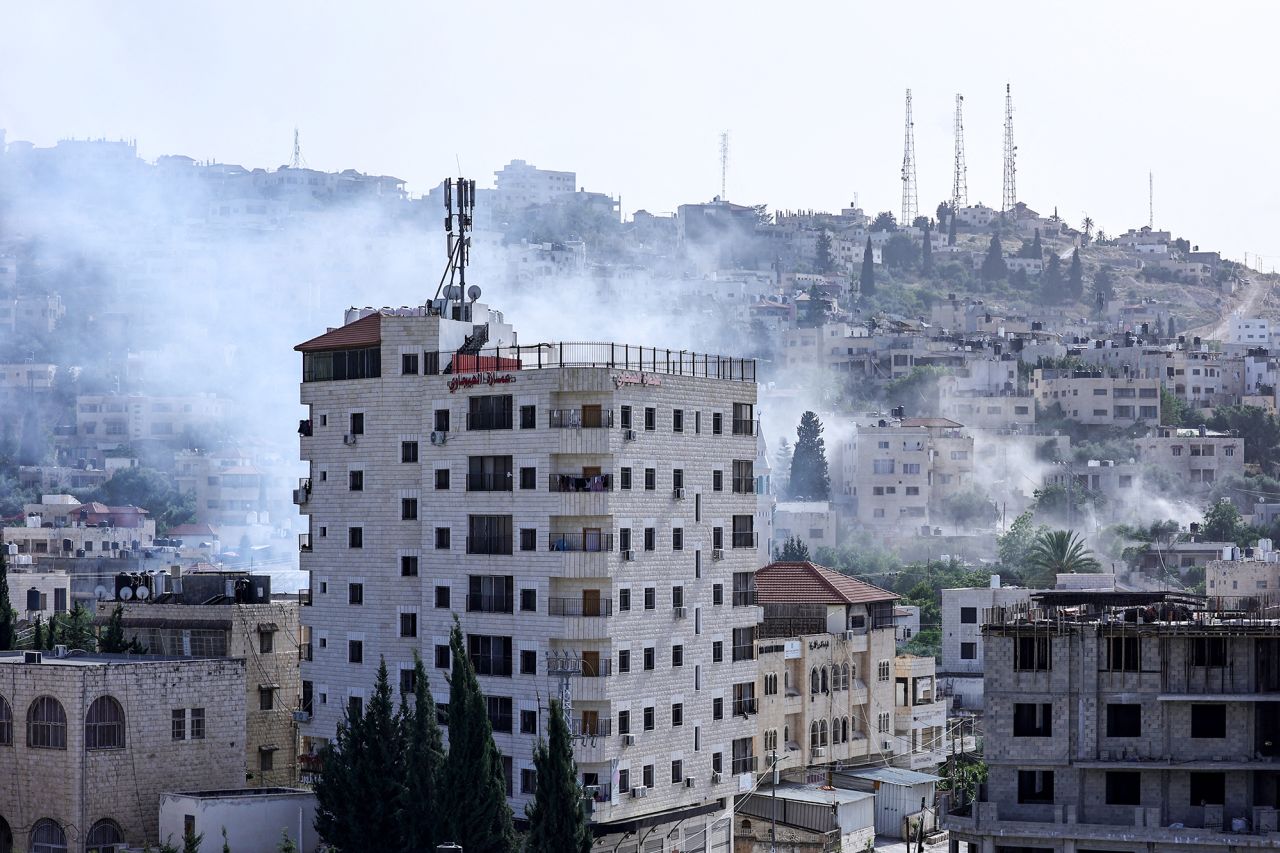 Smoke billows after an explosion during a raid by Israeli forces in the Jenin refugee camp in the occupied West Bank on May 21.