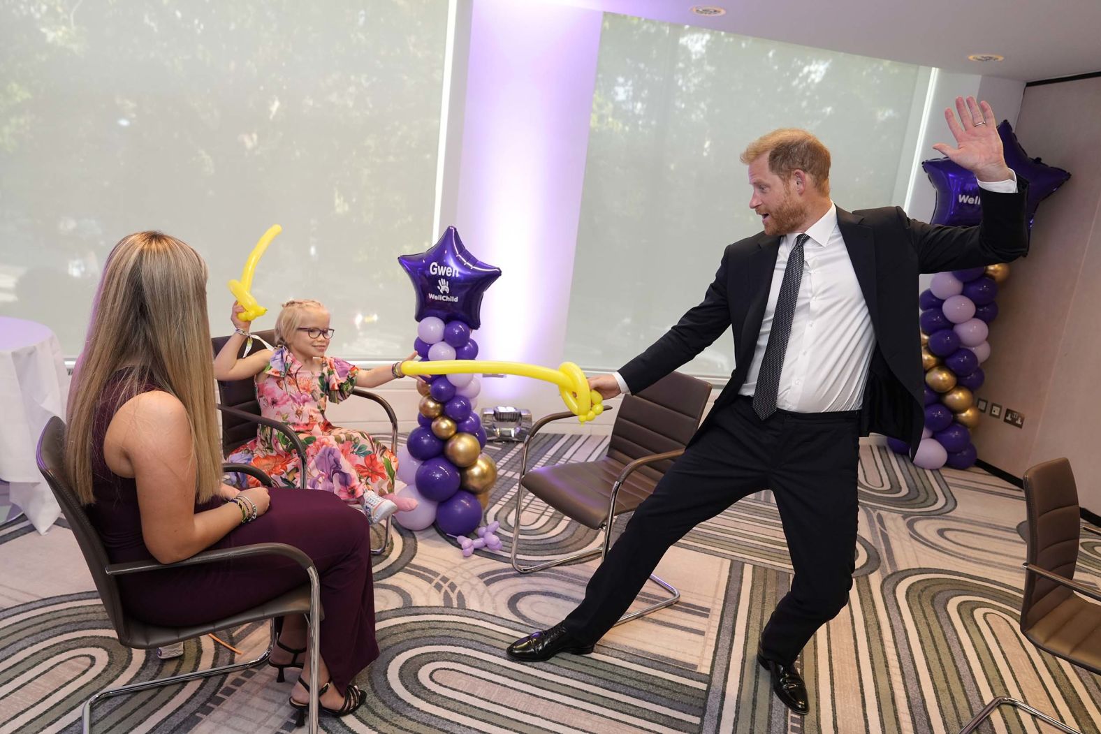 Britain’s Prince Harry uses a balloon sword to play with 9-year-old Gwen Foster at a hotel in London on Monday, September 8. Gwen was recognized at the annual WellChild Awards, which celebrates the achievements and resilience of seriously ill children and their families. While he was in Britain this week, Harry reunited with his father, King Charles III. It was <a href="index.php?page=&url=https%3A%2F%2Fwww.cnn.com%2F2025%2F09%2F10%2Fuk%2Fprince-harry-king-charles-intl">their first face-to-face meeting in 19 months</a>, triggering speculation that the royal family’s long-running rift might soon come to an end.