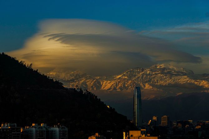 Clouds hover over the Andes Mountains in Santiago, Chile, on Wednesday, June 19.