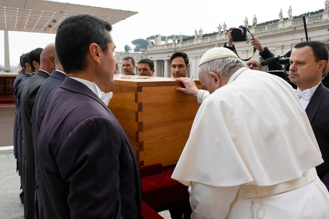 Pope Francis touches the coffin of former Pope Benedict XVI in January 2023. <a href="index.php?page=&url=https%3A%2F%2Fwww.cnn.com%2F2023%2F01%2F05%2Fworld%2Fgallery%2Fpope-benedict-xvi-funeral%2Findex.html">Benedict's funeral </a>was attended by tens of thousands at St. Peter's Square.