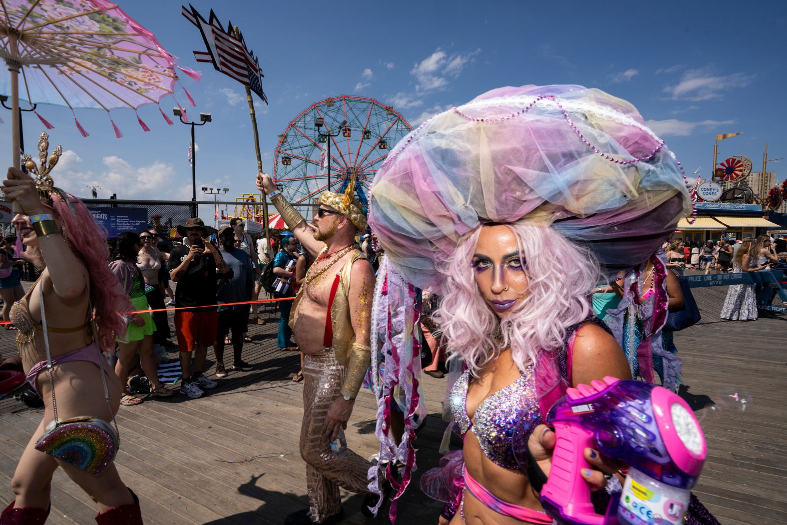 People take part in the annual Mermaid Parade at New York’s <a href="index.php?page=&url=https%3A%2F%2Fwww.cnn.com%2Finteractive%2F2023%2F07%2Fus%2Fconey-island-summer-cnnphotos%2F">Coney Island</a> on Saturday, June 21.