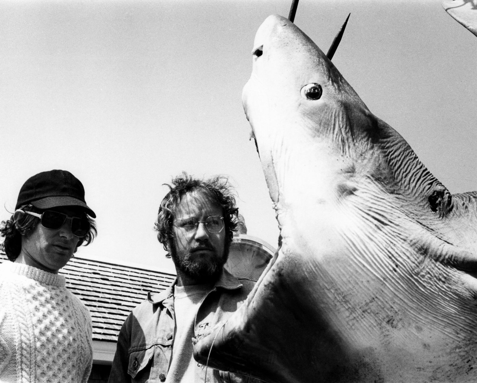 Spielberg, left, and Dreyfuss consider a shark carcass, brought to shore by Amity Island fishermen who believe they've caught the murderous culprit. Dreyfuss <a href="index.php?page=&url=https%3A%2F%2Fwww.vanityfair.com%2Fhollywood%2F2023%2F07%2Fjaws-making-of-spielberg-interview%3Fsrsltid%3DAfmBOopI6ZP8fWZrTbENkPtgy50NJ3sit5uLz_0OMgGyNAe6gdVd9SQw" target="_blank">wasn't</a> Spielberg's first choice for Hooper, but he was convinced after watching the actor in "American Graffiti."