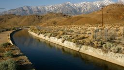 LONE PINE, CA - MAY 09: The Los Angeles Aqueduct carries water from the snowcapped Sierra Nevada Mountains, which carry less snow than normal, to major urban areas of southern California on May 9, 2008 near Lone Pine, California. Urgent calls for California residents to conserve water have grown in the wake of the final Sierras snow survey of the season indicating a snow depth and water content at only 67 percent of normal levels. The Sierra snowpack is vital to California water supplies and officials are preparing plans for mandatory water conservation. In Southern California, the Metropolitan Water District, cut deliveries to farmers by nearly a third and growers in Fresno and Kings counties have not planted about 200,000 acres of crops, a third of the land irrigated by Westlands Water District. Many farmers are now selling their government-subsidized water for profit instead of using it to plant crops. Much of the California water supply comes from the Colorado River where a continuing eight-year drought has lowered water storage to roughly half of capacity. Dry conditions across the West have already doubled the wildfires this year causing fire officials to brace for a possible repeat of the devastating 2007 southern California wildfire season. (Photo by David McNew/Getty Image