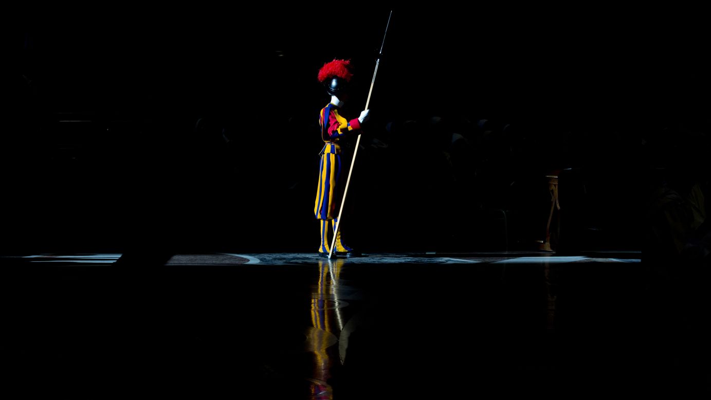 A member of the Swiss Guard attends a New Year's Mass celebrated by Pope Francis at the Vatican on Thursday, January 1.