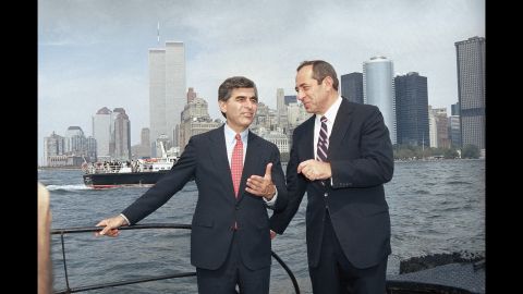 Democratic presidential candidate Michael Dukakis, left, and Cuomo talk on the ferry back to Manhattan on September 4, 1988, after attending ceremonies on Ellis Island, paying tribute to the 17 million immigrants who passed through there. 