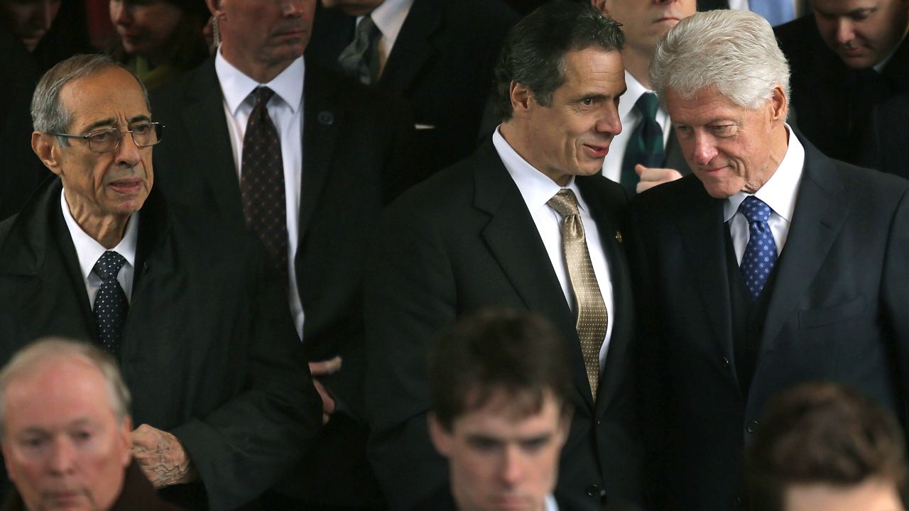 Former New York Gov. Mario Cuomo is far left, followed by New York Gov. Andrew Cuomo and former President Bill Clinton in 2013.