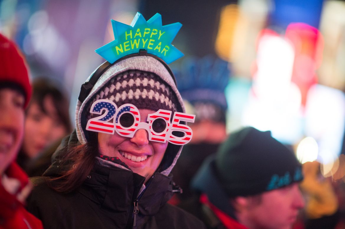 DECEMBER 31 -- NEW YORK: A reveler celebrates New Year's Eve in Times Square. An estimated one million people from around the world gathered in Times Square to ring in 2015,<a href="http://edition.cnn.com/video/data/2.0/video/world/2014/12/31/orig-new-years-celebrations-around-the-world.cnn.html"> just one of many major celebrations across the globe</a>.