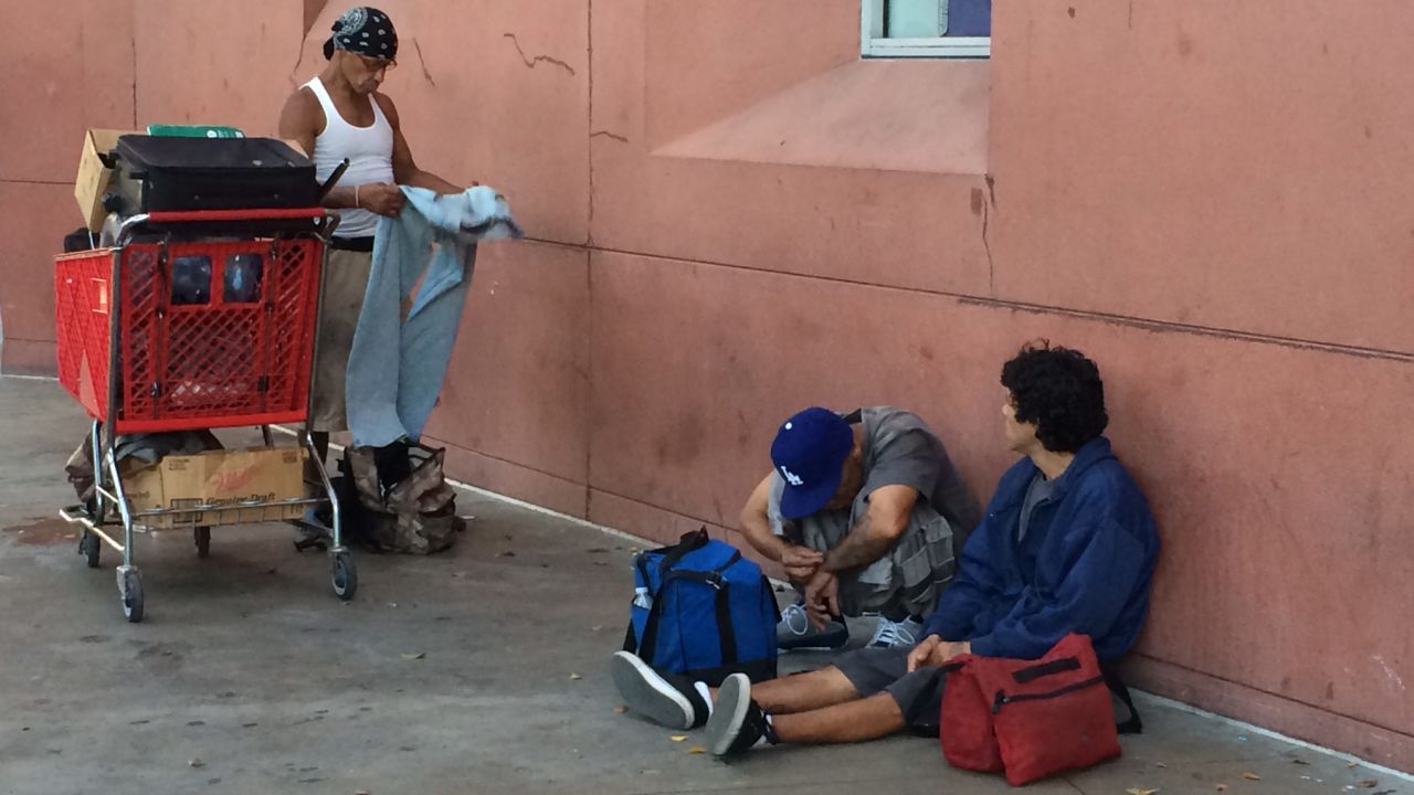Donated food and clothes add to the filth and clutter on Skid Row's streets, Joseph says. 