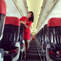 The body of Khairunisa "Nisa" Haidar Fauzi, a flight attendant on  AirAsia Flight QZ8501, was identified in part from her flight uniform and pin.