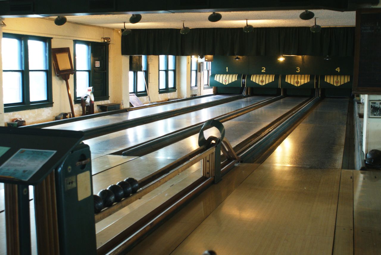 Action Duckpin Bowl opened in 1928 as a 10-pin bowling alley. The alley was closed in the '50s, then reopened and restored in the 1990s to resemble a 1930s-era duckpin bowling alley, which features smaller balls and pins. 