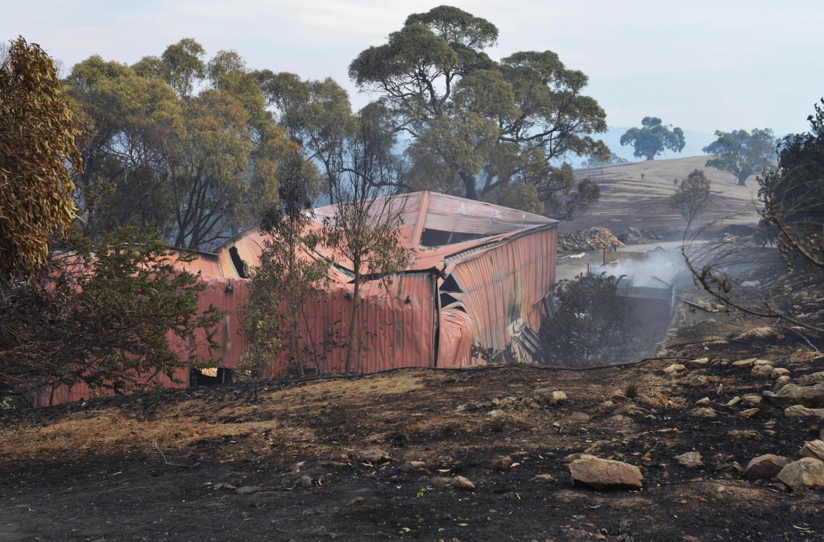A destroyed shed sits in the rural suburb of Upper Hermitage in Adelaide. On Monday authorities confirmed that more than 40 outbuildings, such as sheds, were destroyed in the blaze and that number was expected to increase.