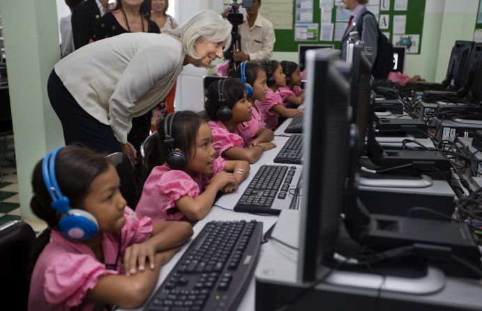 In April 2012, Lagarde was named an officer in the Ordre national de la Légion d'honneur. The Order is the highest decoration in France and is divided into five degrees of which officer is the fourth. <br /><br />Here, Lagarde watches school girls in the computer room at Toutes a l'Ecole school in Kandal province, Cambodia. The school was visited as part of a three country trip to Asia in December 2013.