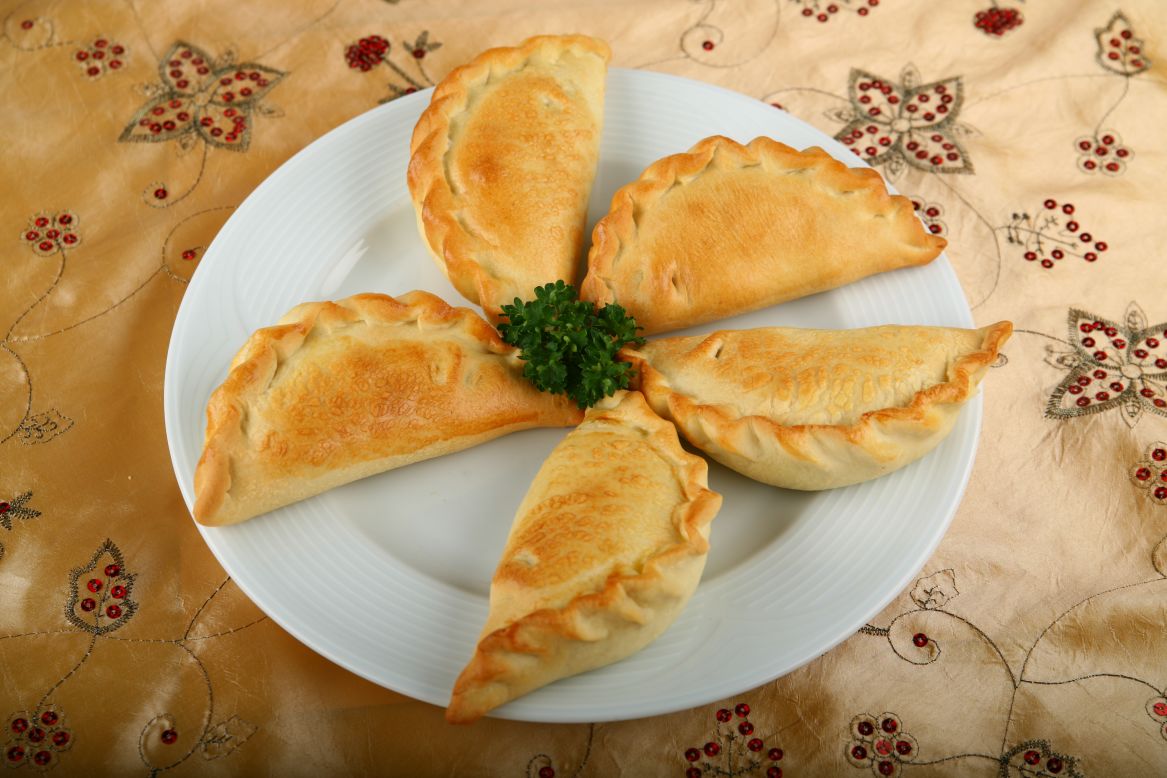 The famous Kybyn savory pastries served at Kybynlar restaurant on the banks of Lake Galves are sought-after delicacies, as authentically Lithuanian as any Baltic fare.