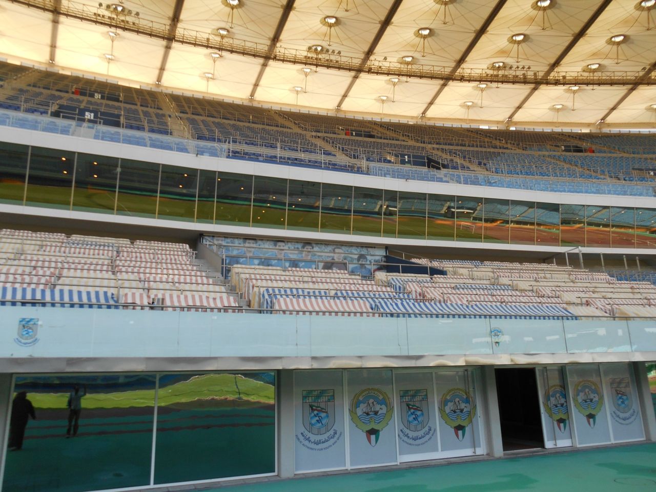 Special care was taken when designing the arena, with metal bars to separate each row as a security measure. A banner featuring the Kuwait team which qualified for the 1982 World Cup overlooks the pitch. 