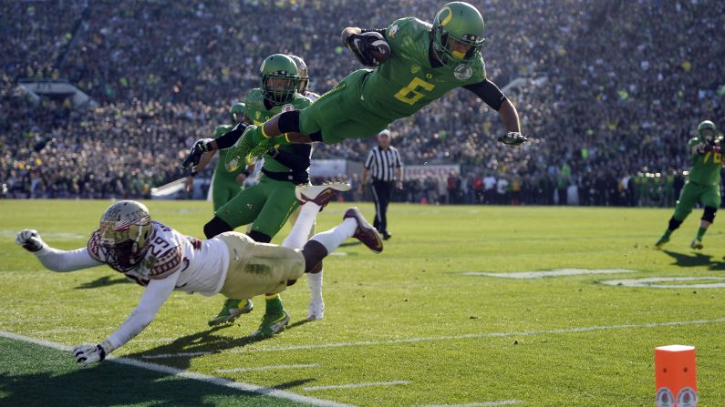 Oregon wide receiver Charles Nelson leaps over Florida State's Nate Andrews during the Rose Bowl, which was played Thursday, January 1, in Pasadena, California. Oregon beat the defending national champions 59-20 in what was the first game of the new College Football Playoff. The Ducks will play Ohio State in the title game on January 12. 