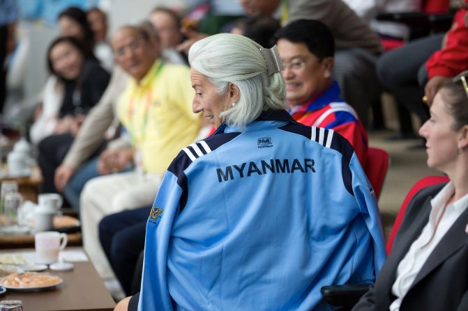 During a visit to Myanmar, Asia in 2013, Lagarde met with  Vice President Nyan Tun, Finance Minister Win Shein and Central Bank Governor Kyaw Kyaw Maung and  politician Aung San Suu Kyi.<br /><br />"The IMF will continue to stand with Myanmar through policy advice," said Lagarde on the last day of her visit. "And through enhanced technical assistance and training, to help the people of Myanmar strengthen their capacity and build the strong institutions needed to sustain a vibrant economy in the years to come." <br /><br />She also stressed the significant macroeconomic benefits that can result from greater participation of women in the economy, including in Myanmar.<br /><br />Lagarde shows off a Myanmar water polo jacket as she watches Myanmar against Thailand in water polo at the 27th Annual SEA Games in December 2013 in Nay Pyi Taw, Myanmar. 