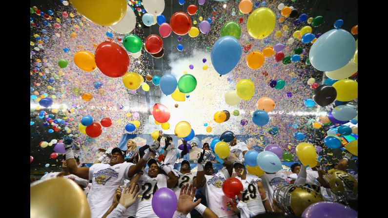The UCLA football team celebrates after winning the Alamo Bowl, which was played in San Antonio on Friday, January 2. The Bruins defeated Kansas State 40-35 to finish their season with a 10-3 record.