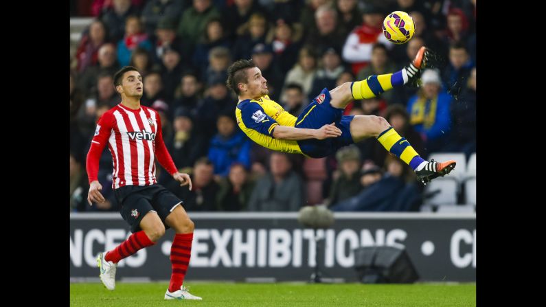 Arsenal's Mathieu Debuchy clears the ball with an overhead kick during a Premier League match in Southampton, England, on Thursday, January 1.