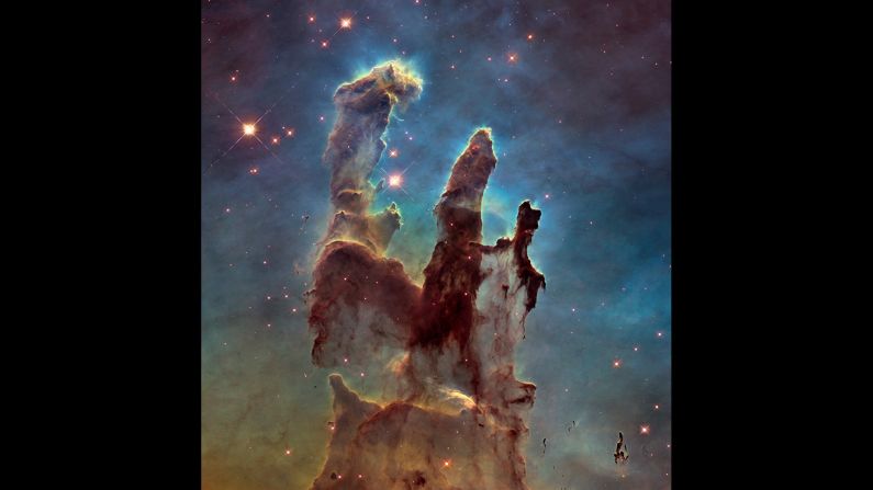 NASA has captured a stunning new image of the so-called "Pillars of Creation," one of the space agency's most iconic discoveries. The giant columns of cold gas, in a small region of the Eagle Nebula, were popularized by a similar image taken by the Hubble Space Telescope in 1995.