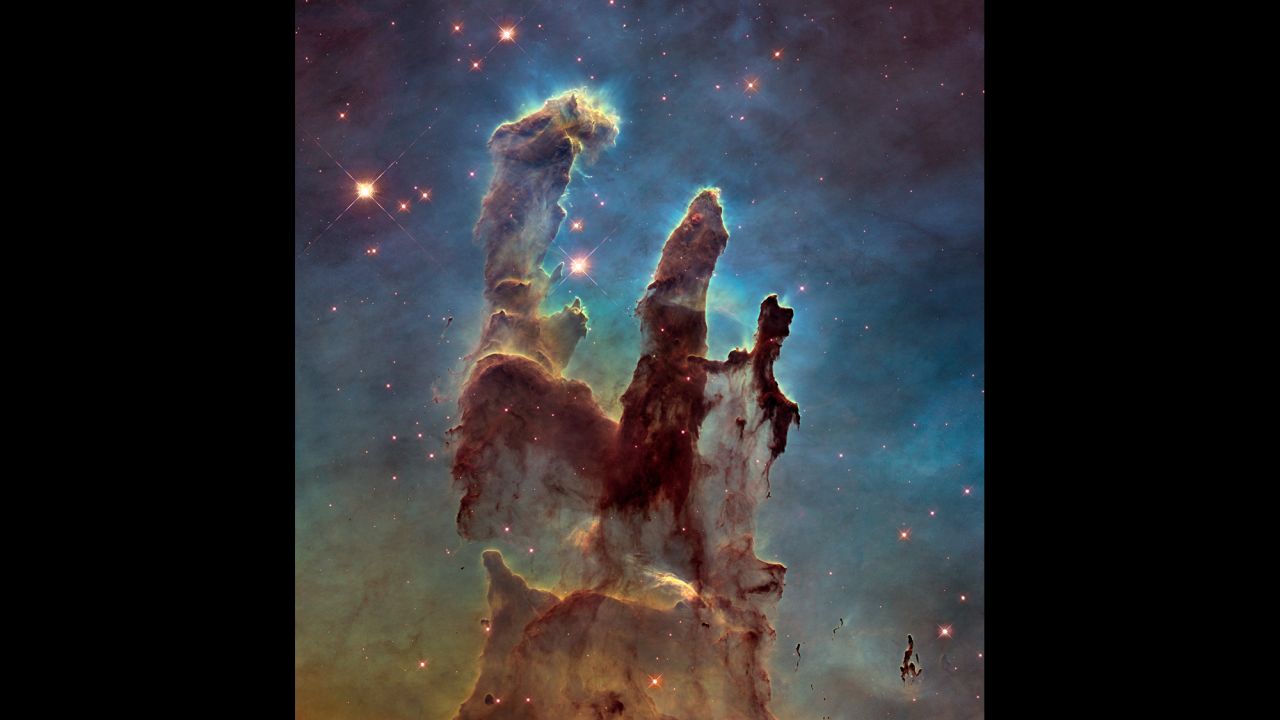 NASA has captured a stunning new image of the so-called "Pillars of Creation," one of the space agency's most iconic discoveries. The giant columns of cold gas, in a small region of the Eagle Nebula, were popularized by a similar image taken by the Hubble Space Telescope in 1995. 